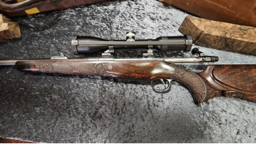 carabine Briano calibre 375 Lion sculpté avec écailles + swarovski