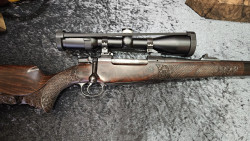 carabine Briano calibre 375 Lion sculpté avec écailles + swarovski